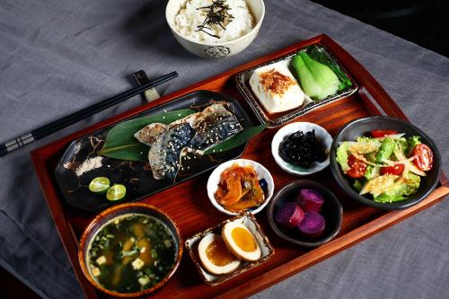 a tray filled with different types of food on a table at Secret Silva in Sanxia