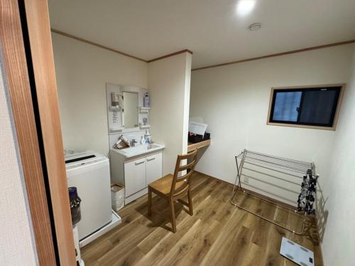 Una cocina o zona de cocina en 熱海網代くす亭
