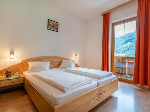 Una cama o camas en una habitación de Apartment in Neustift near Ski Lift, cleaning included