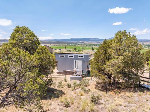 an overhead view of a building in the middle of trees at Hilltop Tiny Home in Panguitch