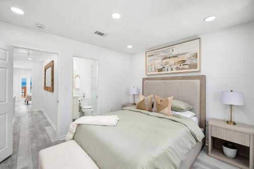 Letto o letti in una camera di Beachfront Luxury House