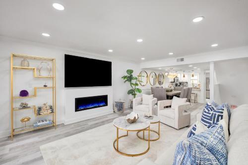 TV o dispositivi per l'intrattenimento presso Beachfront Luxury House