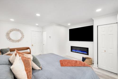 TV o dispositivi per l'intrattenimento presso Beachfront Luxury House