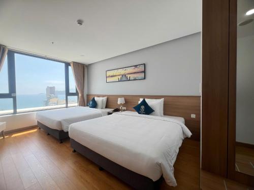 Кровать или кровати в номере Sea Soul Hotel