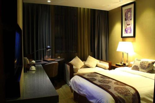 Letto o letti in una camera di Southeast Peninsula Hotel Quanzhou