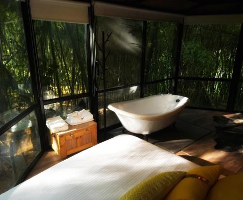Postel nebo postele na pokoji v ubytování Amanatu Ecolodge & Spa