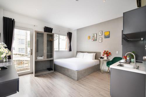 Postel nebo postele na pokoji v ubytování Nicecy Hotel - 218 Le Thanh Ton Street