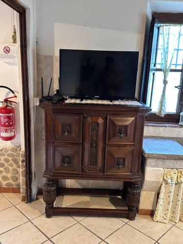 Μια τηλεόραση ή/και κέντρο ψυχαγωγίας στο Case Vacanze Giovanni Garibaldi