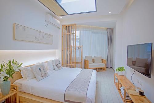 Ένα ή περισσότερα κρεβάτια σε δωμάτιο στο EaseCloud Retreat