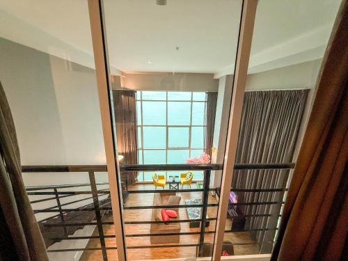 Katil atau katil-katil dalam bilik di HappySty by Golden Hour Maritime Suite