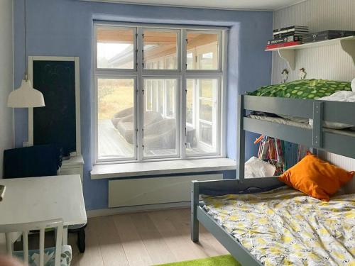 Katil atau katil-katil dalam bilik di Become One With Nature In "Oldes Hytte"