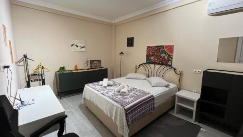 Postel nebo postele na pokoji v ubytování Guest House Kldiashvili