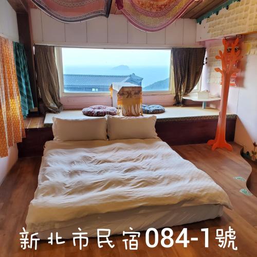 Krevet ili kreveti u jedinici u objektu 九份市下巷石屋民宿