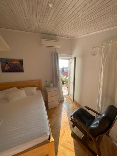 Postel nebo postele na pokoji v ubytování Apartment and rooms Jurišić