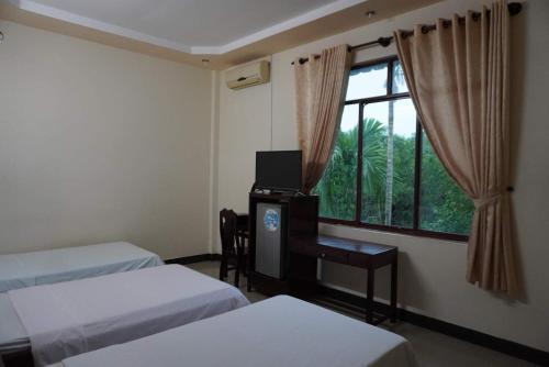 Katil atau katil-katil dalam bilik di Bình Sơn Hotel - Khách sạn tại Dung Quất
