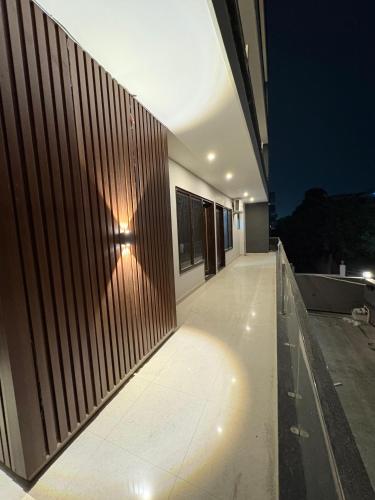 a building with a light on the side of it at Radiant Blu Hotels in Noida