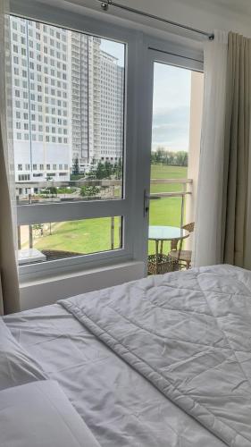Postel nebo postele na pokoji v ubytování L. Casa • Tagaytay Staycation