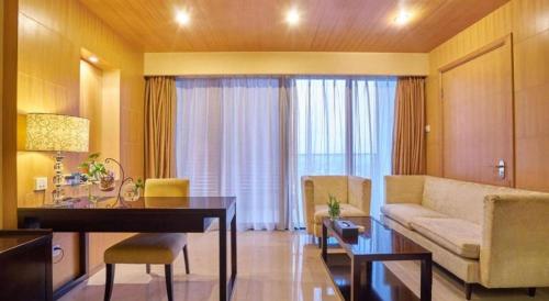 Χώρος καθιστικού στο Huangshan Xuanyuan International Hotel