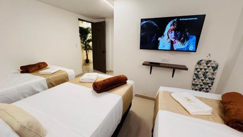 Postel nebo postele na pokoji v ubytování Hotel Jelt Aeropuerto