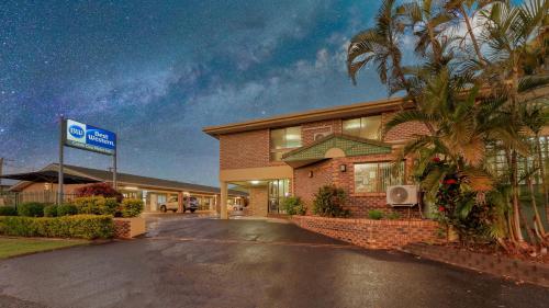 a building with a sign in front of it at Best Western Cattle City Motor Inn in Rockhampton