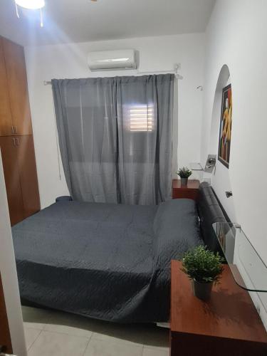 Ένα ή περισσότερα κρεβάτια σε δωμάτιο στο Sunset Paradise Villa Stroumpi