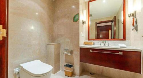 Ένα μπάνιο στο Wudangshan Jianguo Hotel