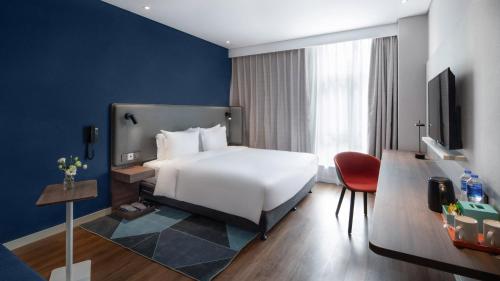 Cama o camas de una habitación en Holiday Inn Express Shanghai Hongqiao North by IHG