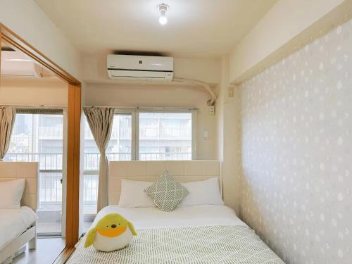高輪ー703にあるベッド