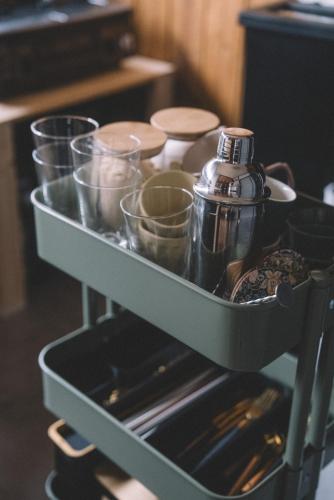 a tray filled with pots and pans on top of an oven at guesthouse TANDEM in Matsumoto