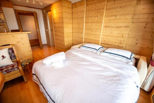 Clouds Apartment Alpin Luxury View and Poolにあるベッド