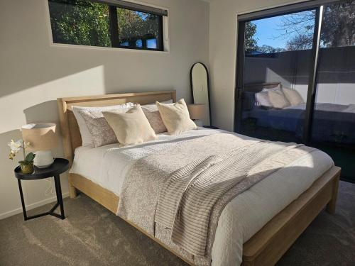 Ένα ή περισσότερα κρεβάτια σε δωμάτιο στο Courtenay Street Abode