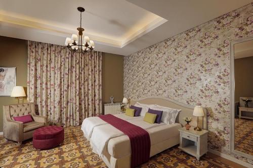 Ένα ή περισσότερα κρεβάτια σε δωμάτιο στο Grand Hotel Bois De Boulogne