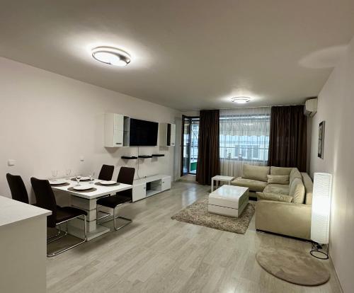 Apartment Garden - two large terraces with hanging chairs and sunset view