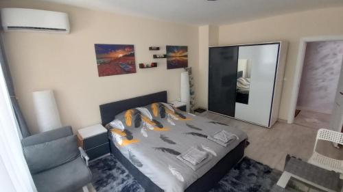 Ένα ή περισσότερα κρεβάτια σε δωμάτιο στο Cosy Apartment