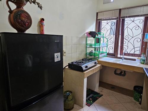 Cuisine ou kitchenette dans l'établissement GWK View Boutique Hotel and Residence