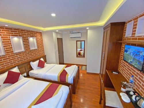 Hotel Shivay Pvt ltdにあるベッド