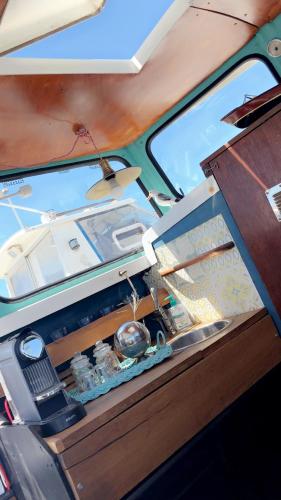 an inside view of a small boat with a room at Docked boat in Le Barcarès