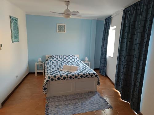 Ένα ή περισσότερα κρεβάτια σε δωμάτιο στο Casa Pelourinho
