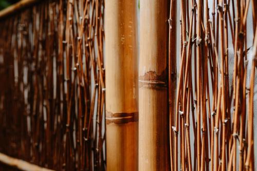 a group of bamboo poles in a room at Residenza Alpaluba in Vasto