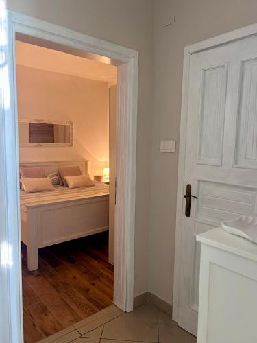 a bedroom with a bed in a room at Apartment Laura in Senj