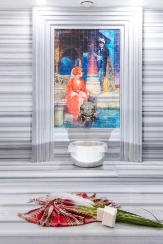 a picture of a painting with flowers on a table at Riviera Zen Hotel Adult Only in Alanya