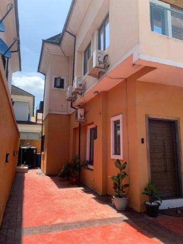 an empty alley in an apartment building at Lamorange Luxurious Apartment in Mushin Halt