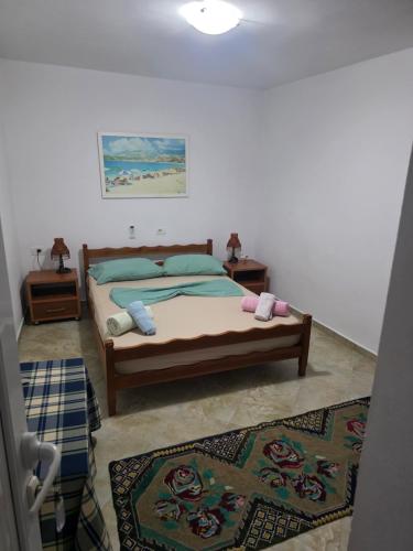 Un pat sau paturi într-o cameră la Beachfront