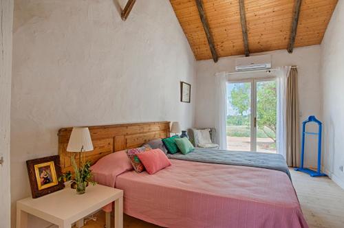 Postel nebo postele na pokoji v ubytování Morgado do Quintão