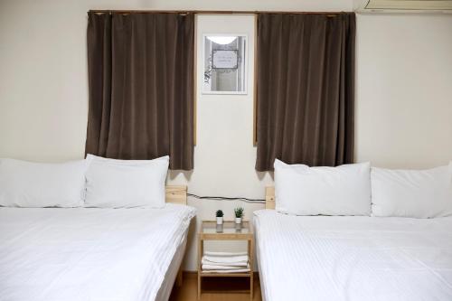Katil atau katil-katil dalam bilik di 京都東福寺鴨川沿いGuest house Kyoan private room貸切独立卫浴鸭川旁边多人一起入住划算