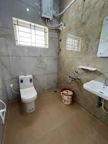 Koupelna v ubytování Sriram Guesthouse Chikmagaluru