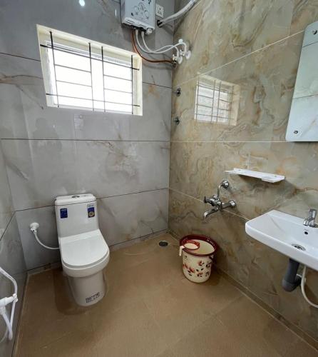 Koupelna v ubytování Sriram Guesthouse Chikmagaluru