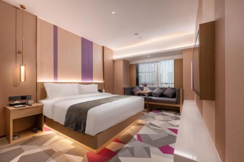 Letto o letti in una camera di Lavande Hotel Kunming Wujiaba CBD Center