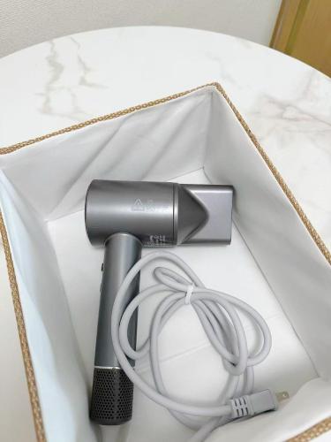 a hair dryer and a hair drier in a box at 高輪ー703 in Tokyo