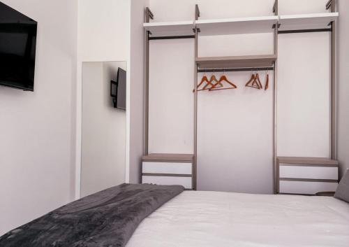 Postel nebo postele na pokoji v ubytování Hotel Vienna